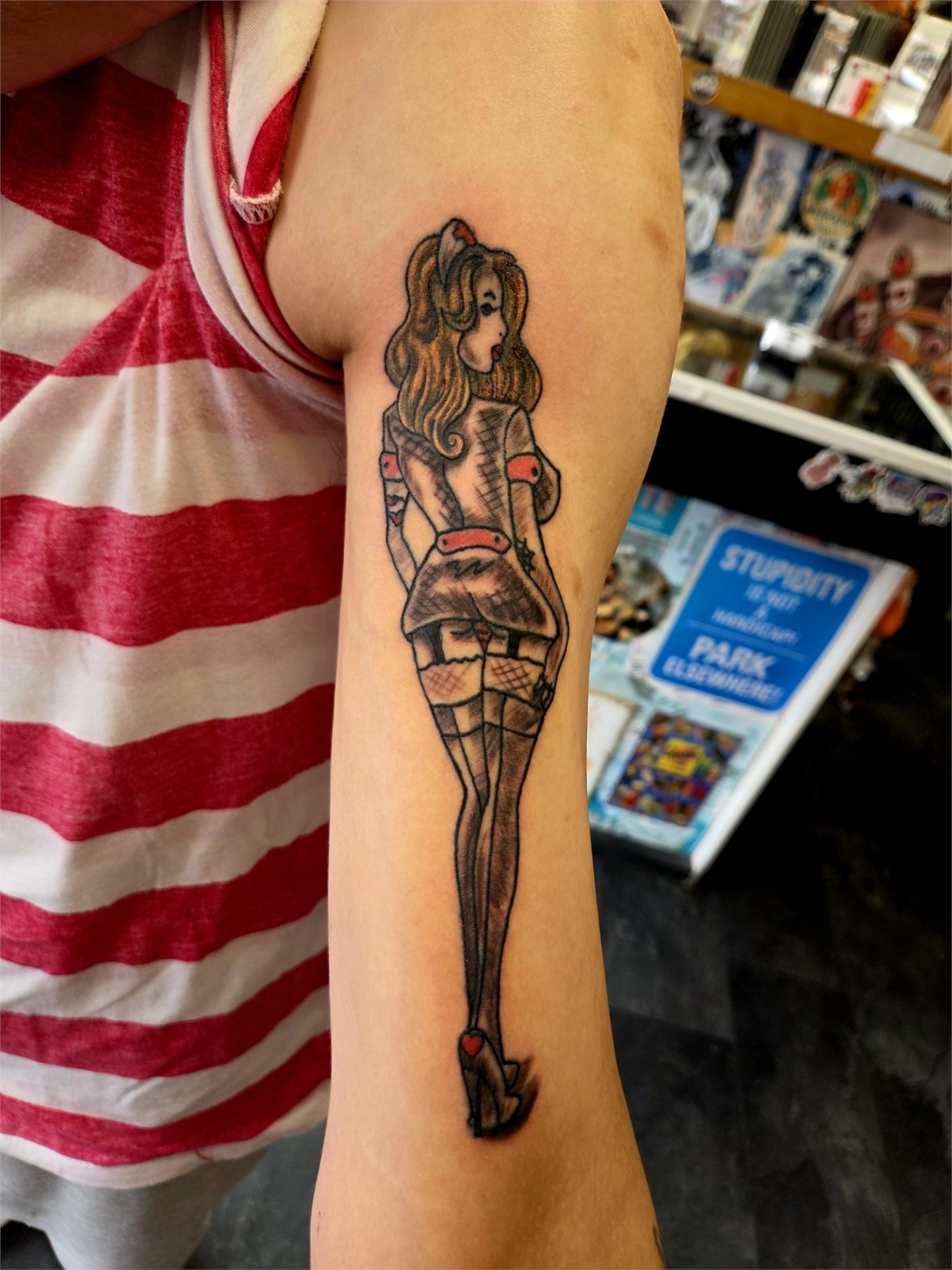 Black and grey gothic woman forearm tattoo